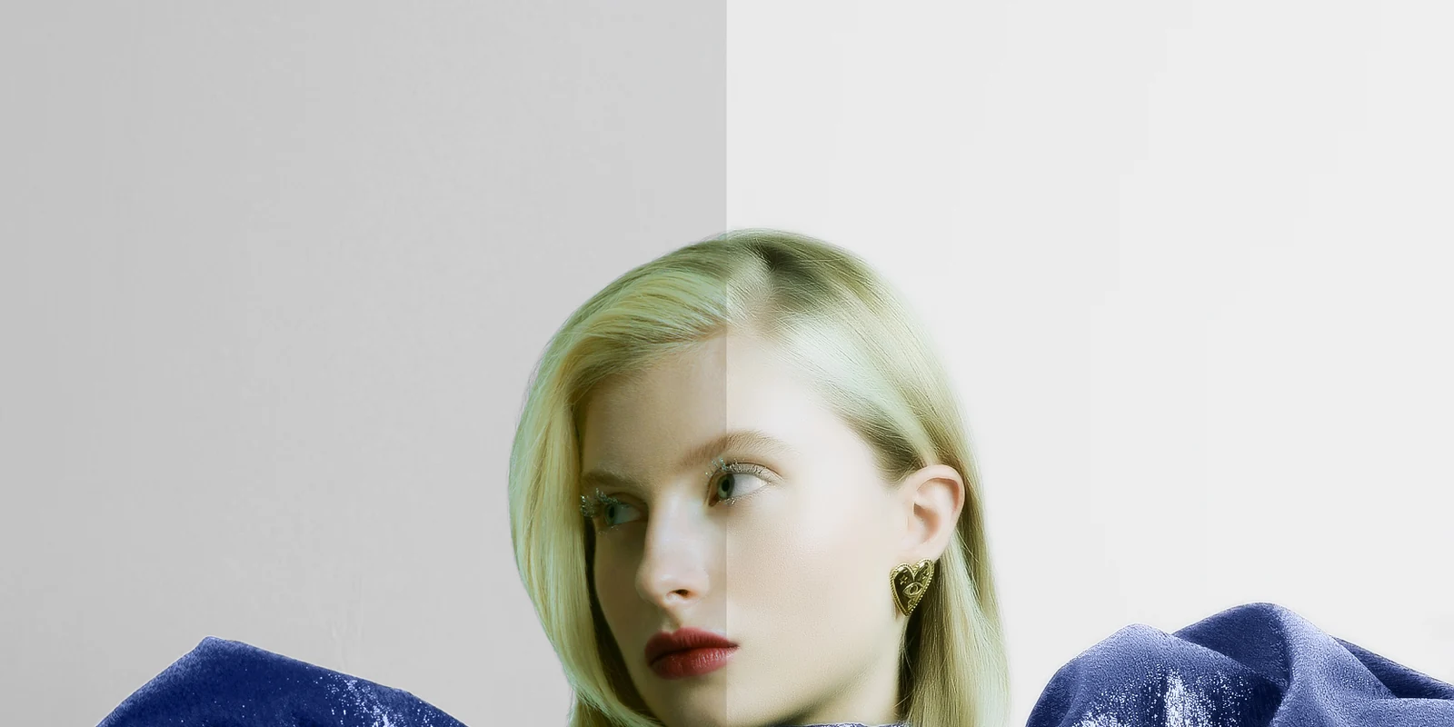 Editorial fashion portrait with a bold metallic blue garment
